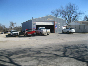 Flusche Auto Repair - Logo