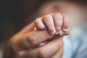 Hugs and Snugs Postpartum Care Services - Logo